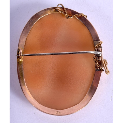 991 - A 9CT GOLD AND CAMEO BROOCH.  Stamped 9CT, 5.7cm x 4.3cm, weight 12g