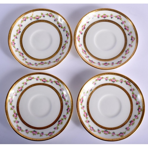 196 - A set of four 20th Century Minton cups and saucers, with pink roses border. (8)