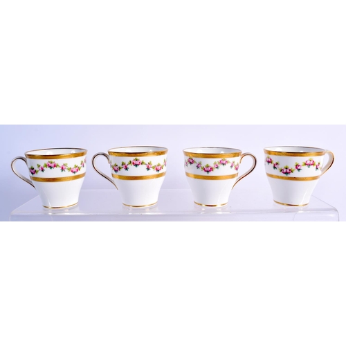 196 - A set of four 20th Century Minton cups and saucers, with pink roses border. (8)