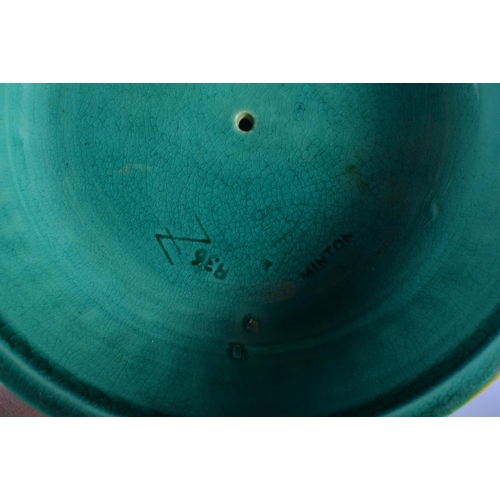 51 - A 19TH MINTON MAJOLICA PEDESTAL DOUPLE PUTTI CENTREPIECE modelled upon a base overlaid with flowers.... 