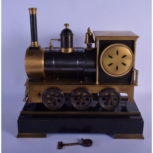 A LARGE CONTINENTAL STEAM NOVELTY TRAIN CLOCK with track. 42 cm x 28 cm. (2)