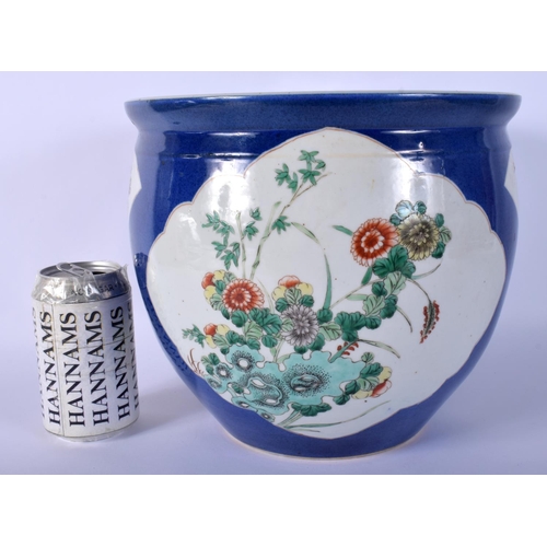 17 - A 19TH CENTURY CHINESE POWDER BLUE GROUND PORCELAIN JARDINIERE Guangxu, painted with foliage and vin... 