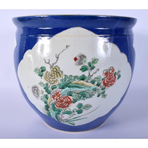 17 - A 19TH CENTURY CHINESE POWDER BLUE GROUND PORCELAIN JARDINIERE Guangxu, painted with foliage and vin... 
