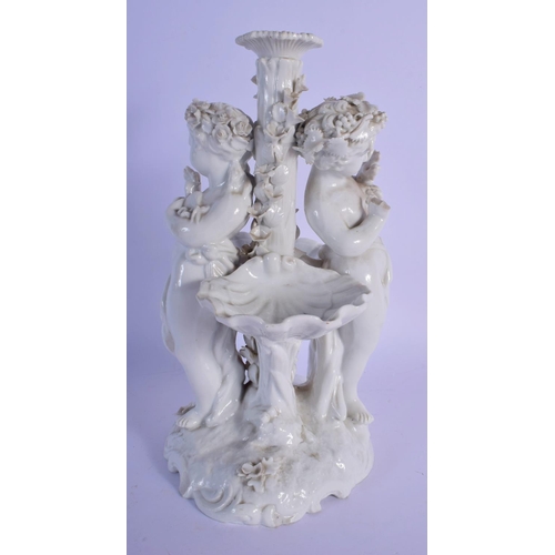 1A - A 19TH CENTURY GERMAN WHITE GLAZED PORCELAIN CENTREPIECE modelled as figures beside shells. 27 cm x ... 