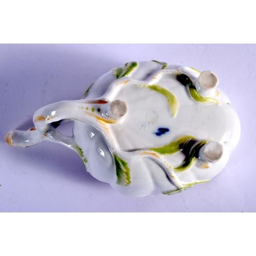 100 - FURSTENBERG RARE LEAF-SHAPED CREAMBOAT OF FLUTED OVAL SHAPE, THE INTERIORS PAINTED WITH COLOURFUL FL... 