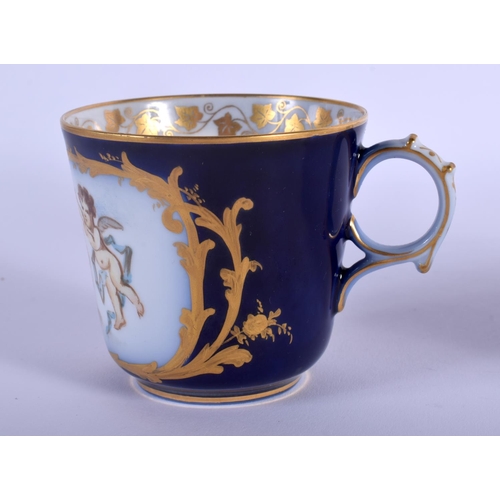 109 - SEVRES COFFEE CUP AND SAUCER PAINTED WITH TWO WINGED CHERUBS A CROWN AND INITIALS LP FOR LOUIS PHILL... 