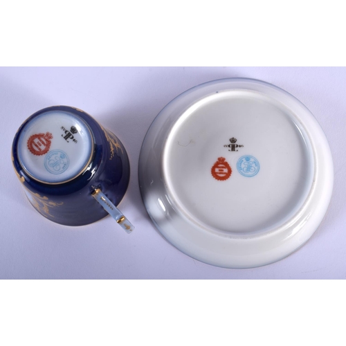 109 - SEVRES COFFEE CUP AND SAUCER PAINTED WITH TWO WINGED CHERUBS A CROWN AND INITIALS LP FOR LOUIS PHILL... 