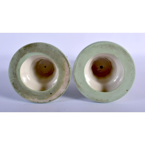 114 - MINTON PAIR OF SEVRES STYLE CHERUB CELADON CANDLESTICKS C.1880. 23.5cm high (Pr)