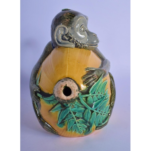 17 - A RARE 19TH CENTURY MINTON MAJOLICA TEAPOT AND COVER in the form of a monkey. 21 cm x 17 cm.