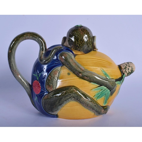 17 - A RARE 19TH CENTURY MINTON MAJOLICA TEAPOT AND COVER in the form of a monkey. 21 cm x 17 cm.