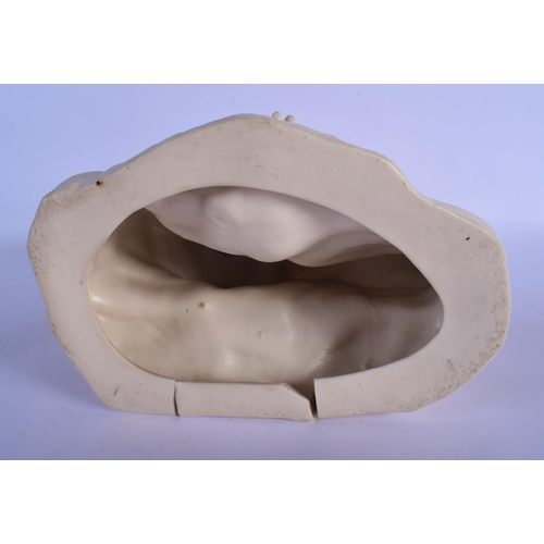 19 - A RARE 19TH CENTURY ENGLISH GLAZED PORCELAIN FIGURE OF A MUSICIAN modelled upon a rocky outcrop. 28 ... 