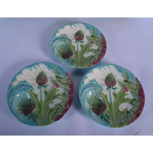 21 - NINE 19TH CENTURY FRENCH MAJOLICA ASPARAGUS DISHES. 23 cm diameter. (9)