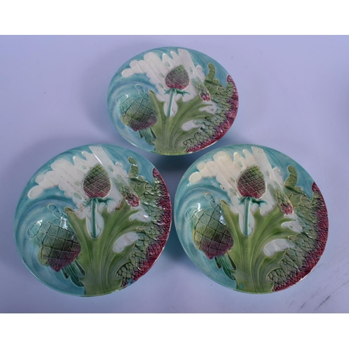 21 - NINE 19TH CENTURY FRENCH MAJOLICA ASPARAGUS DISHES. 23 cm diameter. (9)