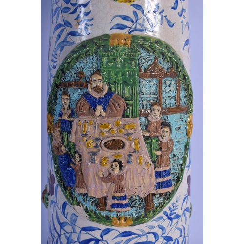 24 - A RARE 18TH/19TH CENTURY EUROPEAN TIN GLAZED POTTERY JUG STEIN painted with figures in relief and an... 