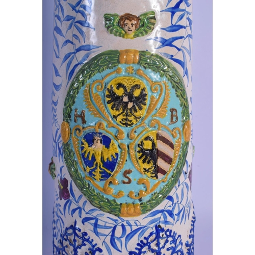 24 - A RARE 18TH/19TH CENTURY EUROPEAN TIN GLAZED POTTERY JUG STEIN painted with figures in relief and an... 