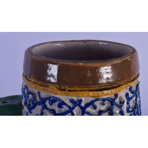 24 - A RARE 18TH/19TH CENTURY EUROPEAN TIN GLAZED POTTERY JUG STEIN painted with figures in relief and an... 