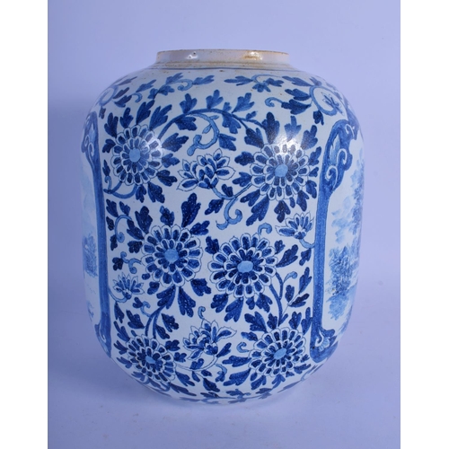 25 - A DUTCH DELFT BLUE AND WHITE GLOBULAR VASE painted with boats within panels of flowers. 22 cm x 13 c... 