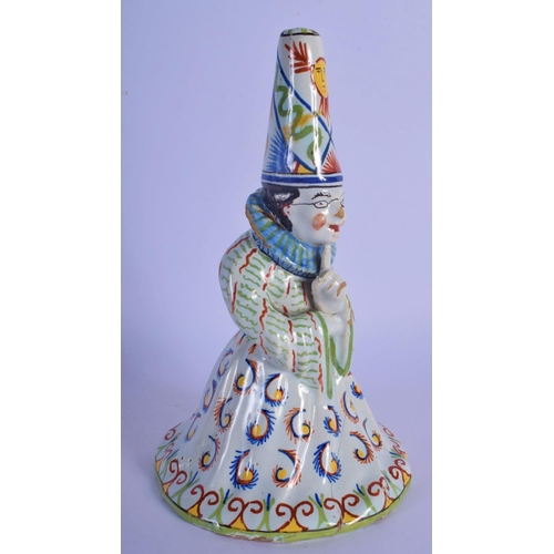 26 - A RARE 19TH CENTURY FRENCH FAIENCE GLAZE JESTER TYPE BELL modelled in floral robes. 21 cm x 8 cm.