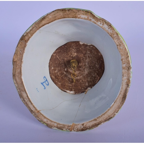 26 - A RARE 19TH CENTURY FRENCH FAIENCE GLAZE JESTER TYPE BELL modelled in floral robes. 21 cm x 8 cm.