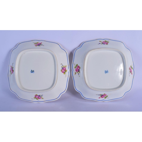 28 - A PAIR OF EARLY 20TH CENTURY FRENCH LIMOGES PORCELAIN DISHES painted with flowers. 22 cm square.