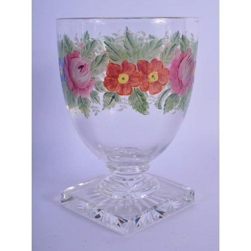 30 - AN ANTIQUE ENAMELLED GLASS RUMMER painted with flowers. 15 cm high.