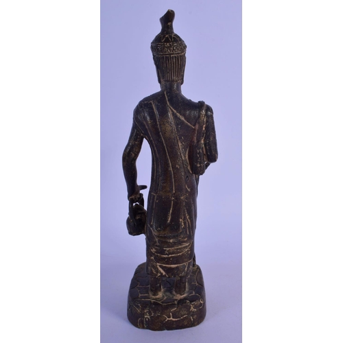 302 - AN 18TH/19TH CENTURY MIDDLE EASTERN BRONZE FIGURE OF A MALE modelled holding a teapot and staff. 24 ... 