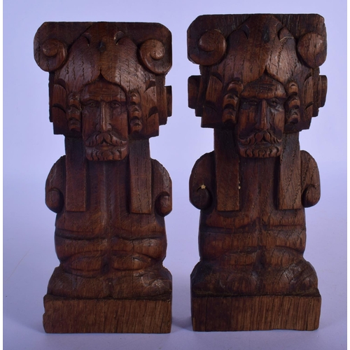 304 - A PAIR OF 18TH CENTURY NORTHERN EUROPEAN CARVED TREEN WOOD PLAQUES depicting bearded males. 16 cm x ... 