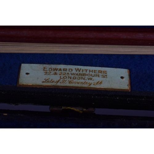 306 - A 19TH CENTURY GERMAN VIOLIN with two bows and contained within an Edward Withers case. 58 cm long. ... 
