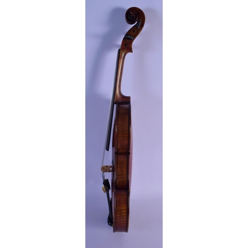 306 - A 19TH CENTURY GERMAN VIOLIN with two bows and contained within an Edward Withers case. 58 cm long. ... 