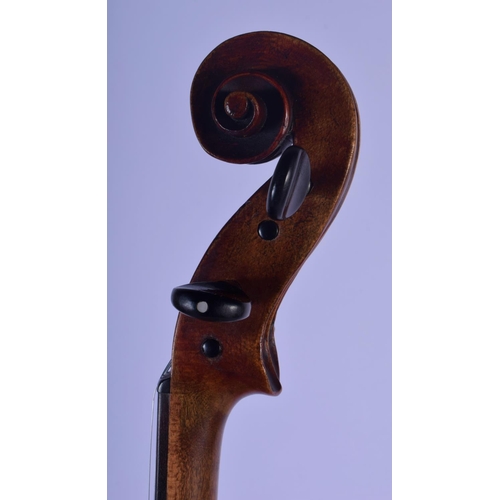 306 - A 19TH CENTURY GERMAN VIOLIN with two bows and contained within an Edward Withers case. 58 cm long. ... 
