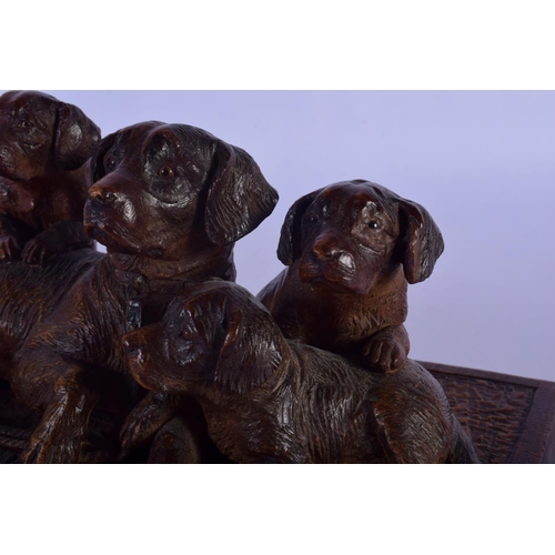 311 - A FINE 19TH CENTURY BAVARIAN BLACK FOREST CARVED WOOD FIGURE OF DOGS in the manner of Walter Mader. ... 