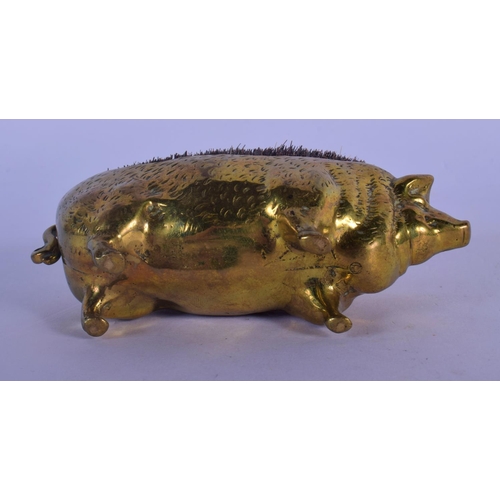 312 - AN EARLY VICTORIAN BRASS PEN PIG WIPE. 10 cm wide.