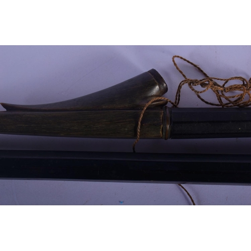 316 - A VERY UNUSUAL 19TH CENTURY TRIBAL CARVED RHINOCEROS HORN SPEAR possibly Polynesian. 60 cm long.