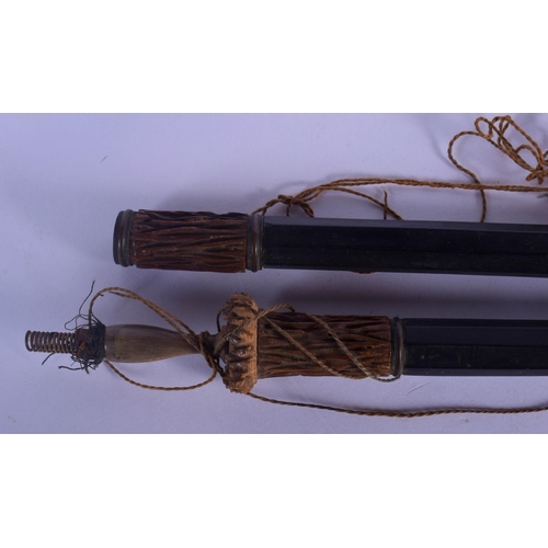 316 - A VERY UNUSUAL 19TH CENTURY TRIBAL CARVED RHINOCEROS HORN SPEAR possibly Polynesian. 60 cm long.