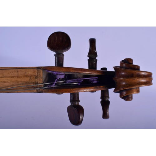 318 - A CASED ANTIQUE SINGLE PIECE BACK VIOLIN bearing Italian label to interior dated 1803. 58 cm long.