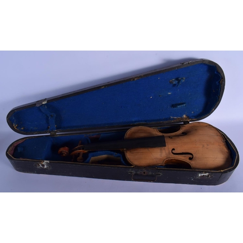 319 - A CASED ANTIQUE TWO PIECE BACK VIOLIN possibly by Giovanni Tonini, Bologna, bearing label to interio... 