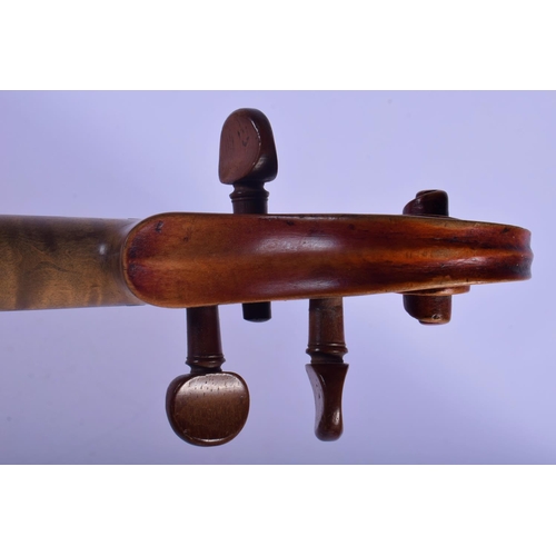 319 - A CASED ANTIQUE TWO PIECE BACK VIOLIN possibly by Giovanni Tonini, Bologna, bearing label to interio... 