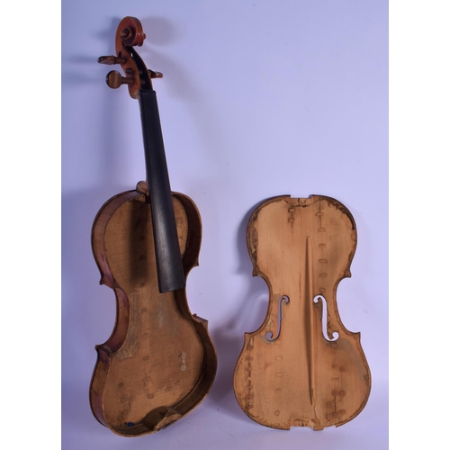 319 - A CASED ANTIQUE TWO PIECE BACK VIOLIN possibly by Giovanni Tonini, Bologna, bearing label to interio... 