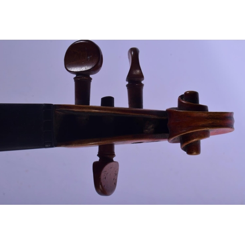 319 - A CASED ANTIQUE TWO PIECE BACK VIOLIN possibly by Giovanni Tonini, Bologna, bearing label to interio... 