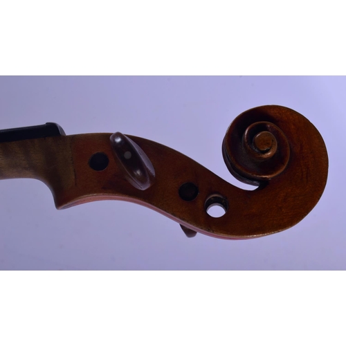 319 - A CASED ANTIQUE TWO PIECE BACK VIOLIN possibly by Giovanni Tonini, Bologna, bearing label to interio... 