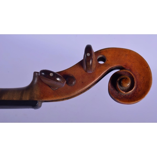 319 - A CASED ANTIQUE TWO PIECE BACK VIOLIN possibly by Giovanni Tonini, Bologna, bearing label to interio... 