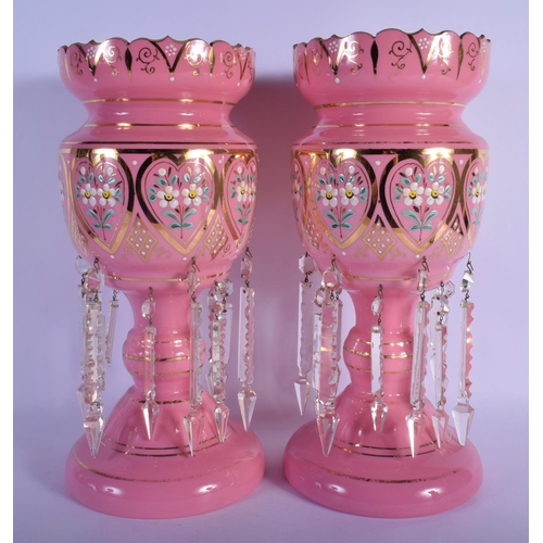 32 - A PAIR OF PINK ENAMELLED OPALINE GLASS LUSTRES. 38 cm x 15 cm.