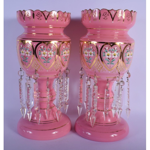 32 - A PAIR OF PINK ENAMELLED OPALINE GLASS LUSTRES. 38 cm x 15 cm.