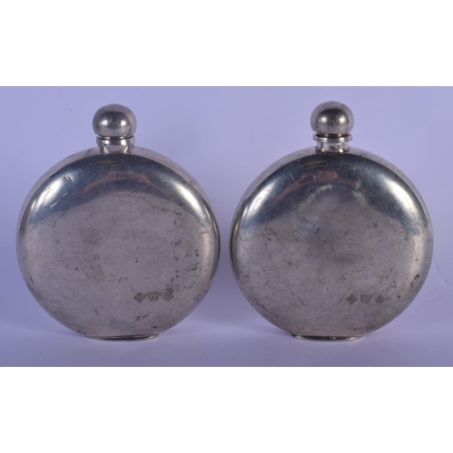 323 - A RARE PAIR OF VINTAGE SILVER PLATED HUNTING HIP FLASKS depicting a hunter and golfer. 12 cm x 9 cm.