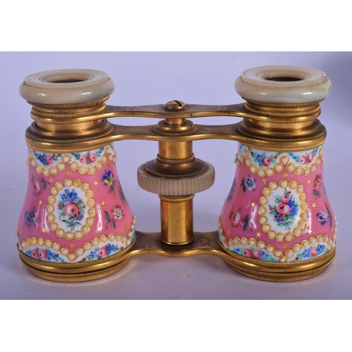 329 - A PAIR OF EARLY 20TH CENTURY EUROPEAN ENAMELLED OPERA GLASSES painted with flowers. 9 cm x 7 cm exte... 
