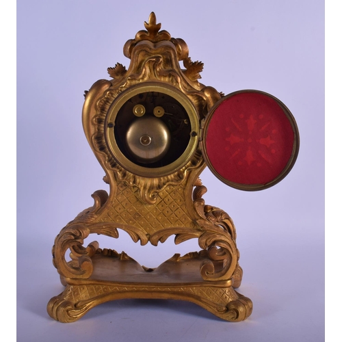 330 - A LOVELY 19TH CENTURY FRENCH ORMOLU MANTEL CLOCK overlaid with scrolling acanthus and hanging berrie... 