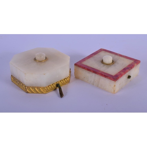 331 - TWO ART DECO MIXED MARBLE DESK BUTTON SWITCHES. 6 cm wide. (2)