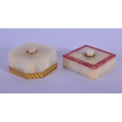 331 - TWO ART DECO MIXED MARBLE DESK BUTTON SWITCHES. 6 cm wide. (2)