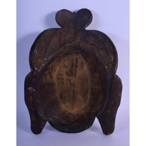 337 - A 19TH CENTURY MIDDLE EASTERN ASIAN CARVED WOOD MASK depicting a long eared male. 25 cm x 15 cm.
