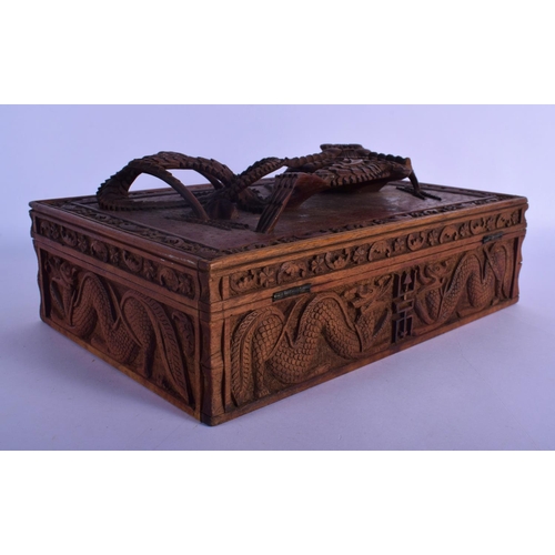 338 - AN UNUSUALLY FINE 19TH CENTURY BURMESE CARVED WOOD BASKET wonderfully formed with a three dimensiona... 